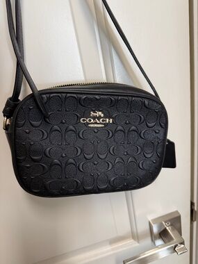 COACH Black Embossed Signature Crossbody with Gold Logo